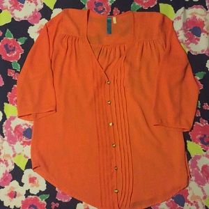 Francesca’s “buttons” orange shirt size Large